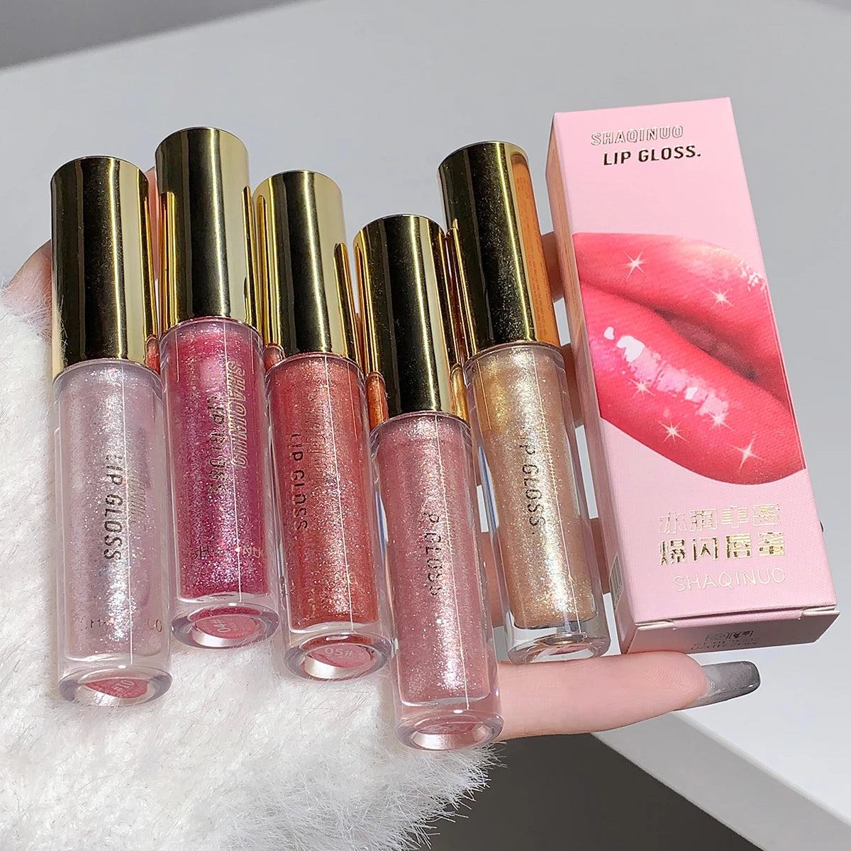 Plump & Sparkling Moisturizing Lip Gloss – 5 Shades