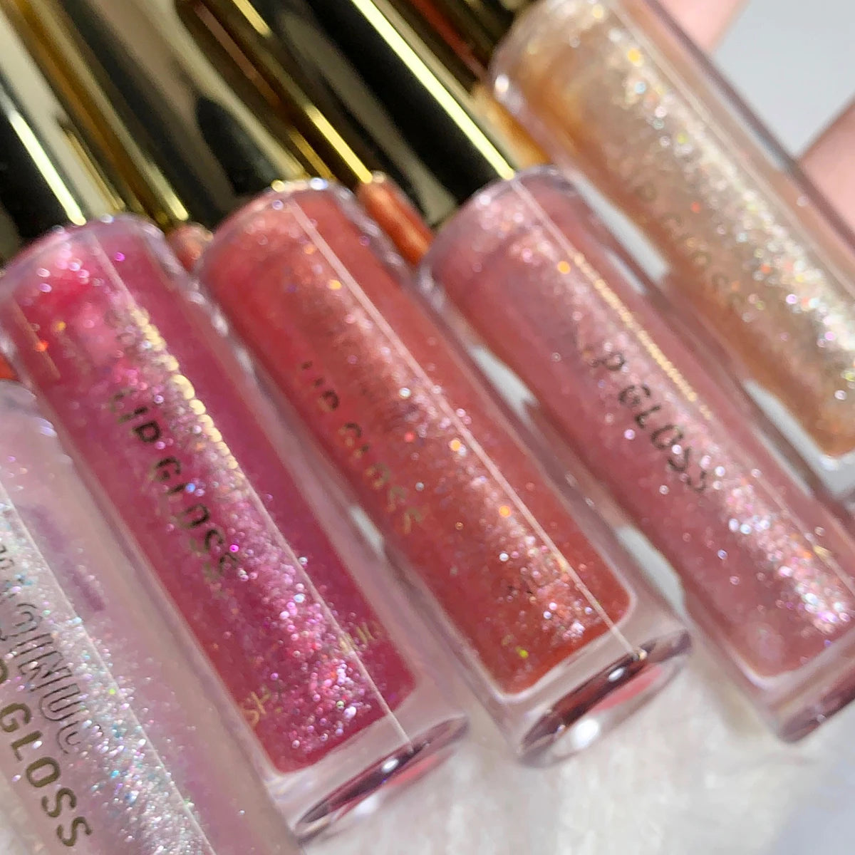 Plump & Sparkling Moisturizing Lip Gloss – 5 Shades