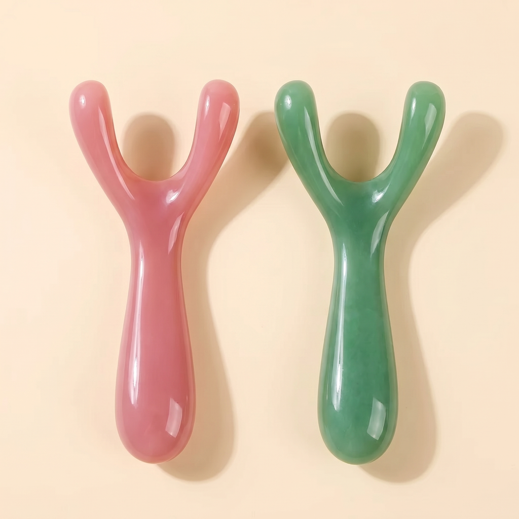 Velé Y-shape resin gua sha face massager, pink and green