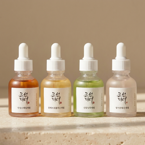 Botanical Revive Serum — four essences on stone